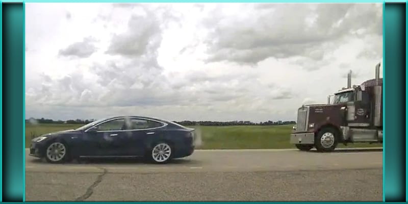 Canada Canadian man charged for asleep sleeping at the wheel Tesla on autopilot Alberta dangerous driving speeding